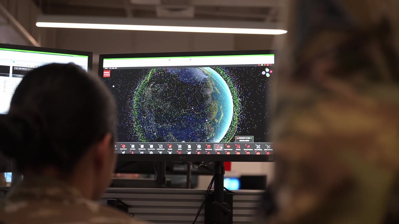 Space Force operators monitoring orbital activity — video still