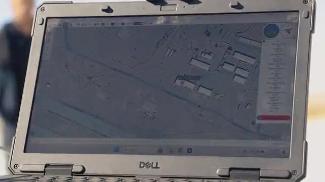 People working with technology